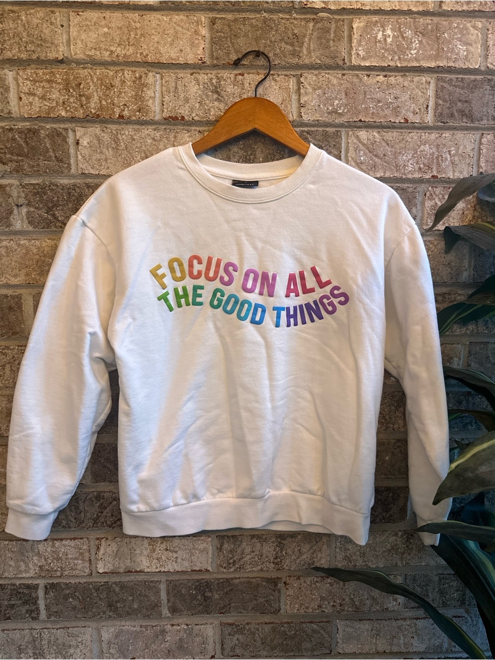 White Crewneck Sweater with Rainbow "Focus On All The Good Things" Graphic